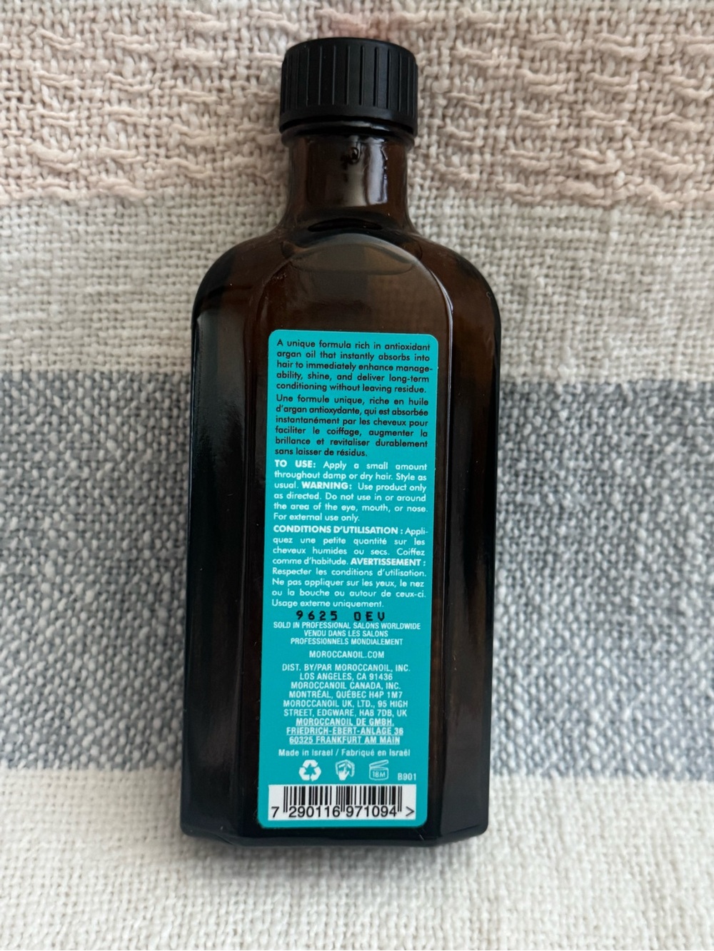 Moroccanoil Treatment Bottle with Teal and Purple Label - Picture 2 of 3